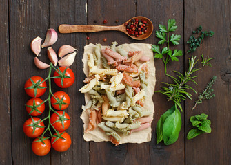 Tricolor pasta, vegetables and herbs