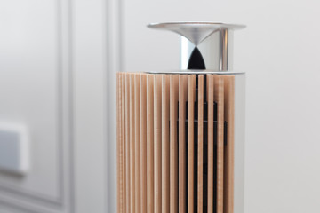 New modern musical columns made of wood and metal as a source of pure sound in sunshine