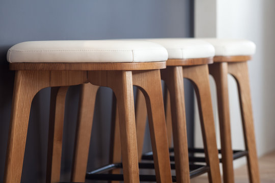 Modern Soft Dining Chairs Close Up. Chairs Near The Bar In The Kitchen