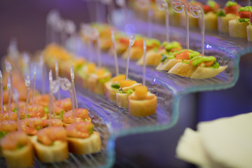 Glass shots  pastry. wedding catering food. mini canapes food.  tasty dessert. Beautiful decorate catering banquet table.  snacks and appetizers. wedding celebration