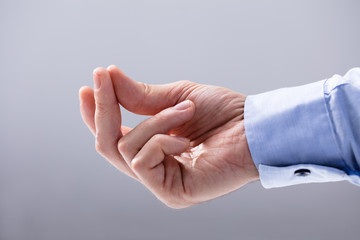 Man's Hand Snapping His Finger