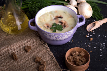 Mushroom soup on a wooden table