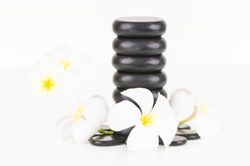 Spa concept with hot stones and Frangipani flowers