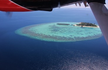 Maafushivaru island, aerial view from seaplane. Ari Atoll, Maldives