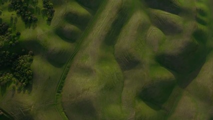 Aerial view of rolling green hills in northern California