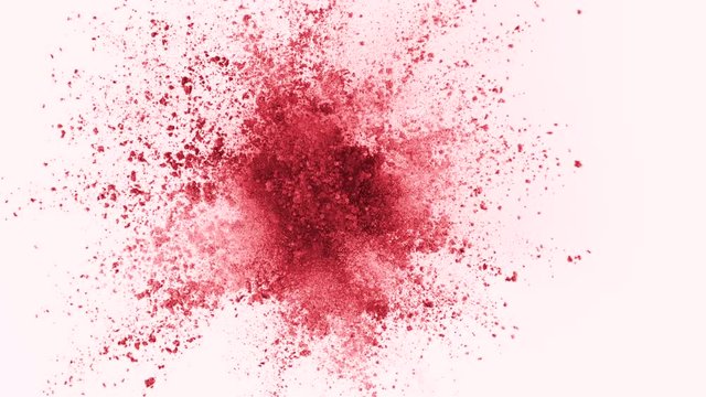 Red powder exploding on white background in super slow motion, shot with Phantom Flex 4K