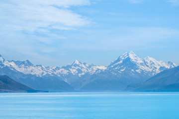 Beautiful scene of Mt Cookbeside the lake with blue sky and clouod in summer. New Zealand