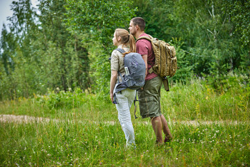 two travelers in the forest