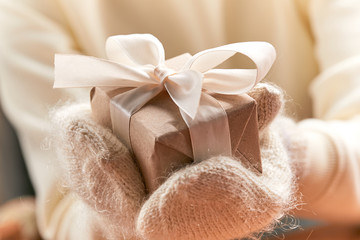 hands holding craft gift box