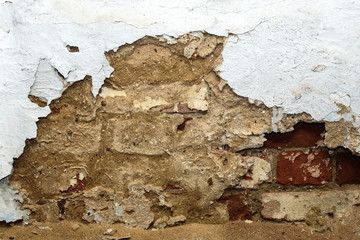 background  brick wall texture with peeling and sprinkle shabby old plaster
