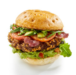 Tasty pork belly burger with bacon and avocado