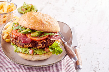 Avocado and spek or bacon on a tasty burger