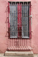 Fototapeta na wymiar Grille on a house in Camaguey in Cuba 