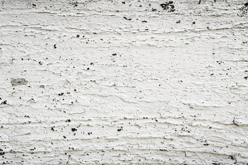 Peeling white paint on wood grunge background texture pattern for vintage design.