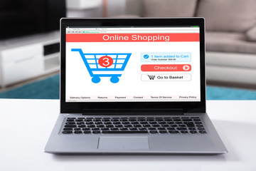 Online Shopping Website On Laptop