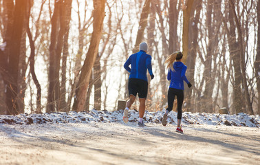 Male and female running outdoor