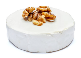 Round brie or camambert cheese on a white background