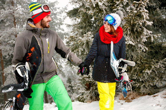 couple snowboarder enjoying outdoors at ski resort in the mountain