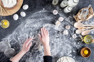 cropped shot of woman baking homemade bread