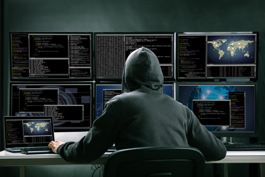 Hacker Using Multiple Computers For Stealing Data