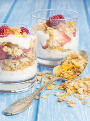 Delicious healthy breakfast of red fruits with cereal