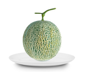 Melon in white plate on white background