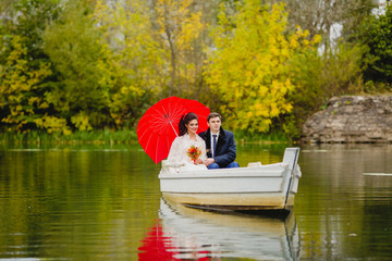 Couple newlyweds in the white boat