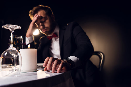 Handsome Upset Man Waiting For Romantic Date In Restaurant