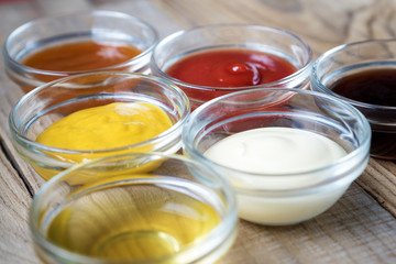bowls of various dip sauces, top view