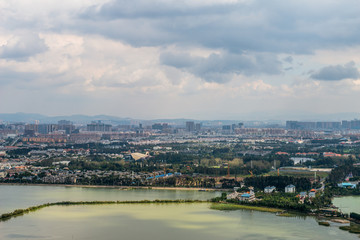 Fototapeta na wymiar Cityscape top view of Kunming, Kunming is capital of Yunnan province most famous city in CHINA