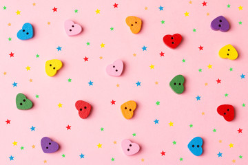 Valentine's day background with heart-shaped buttons.