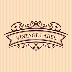 Vintage calligraphic label. Ornate logo template for design of invitations, greeting cards, banners, posters, placards, badges, hotel, restaurant, business identity. Vector illustration.