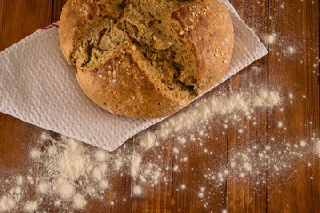 Traditional Irish Soda Bread Made For St. Patrick's Day Served On Floured Wooden Table