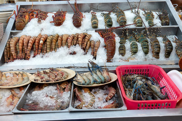 Different types of seafood lined on ice