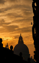 Venice sunset with Salute Basilica dome, seen from Paglia Bridge, close to Doge Palace