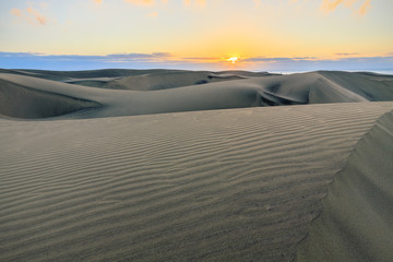 Landscape of empty sand desert. Dunes of Maspalomas, Gran Canaria island.