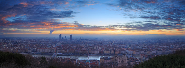 Clouds over Lyon during a colorful sunrise, seen from viewpoint and landmark Fourfiere.