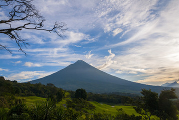 Fototapeta premium Agua volcano sunrise in Guatemala, golf club La Reunion. 3,760 m. Central America. Nature reserve attractive landscape tourism.