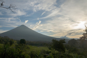 Agua volcano sunrise in Guatemala, golf club La Reunion. 3,760 m. Central America. Nature reserve attractive landscape tourism.