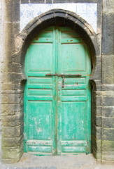 Traditional colorful Moroccan door in medina - old part of town in Morocco