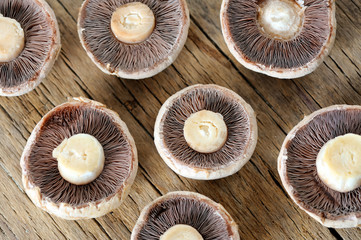 Sliced mushrooms on  wooden table