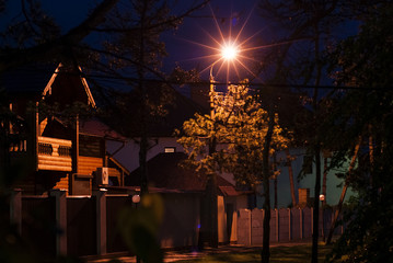 The night lamp illuminates the street