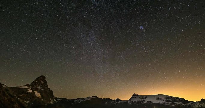 starry sky Time Lapse over the majestic Matterhorn Cervino mountain peak and the Monte Rosa glaciers, italian side.