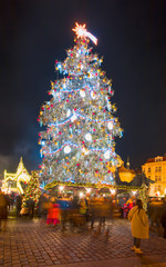 Christmas tree in magical city of Prague at night, Czech Republic 