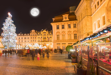 Fototapeta na wymiar Christmas tree in magical city of Prague at night, Czech Republic 