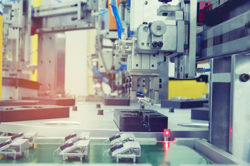 Automatic part assembly machine. Auto robot machine used electrics and air pressure.