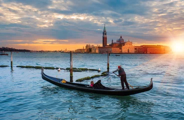 Foto op Canvas Beautiful view of traditional gondola with gondolier on famous Canal Grande © muratart