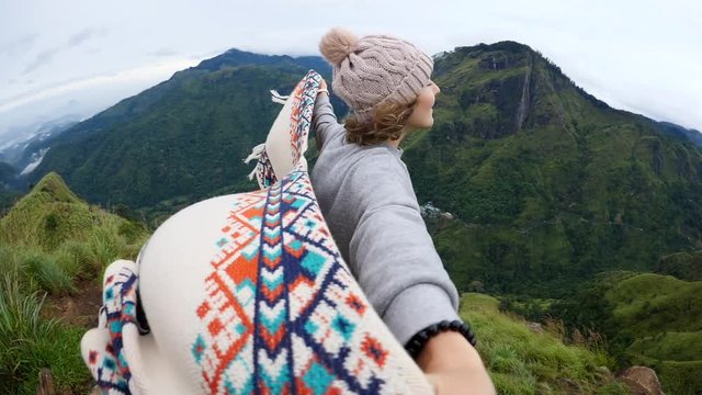 Romantic Inspirational Hiker Woman In Poncho Standing On Top Of Mountain With Arms Outstretched. Slow Motion. HD, 1920x1080.