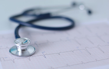 docter workplace with a stethoscope Cardiogram chart with medical table closeup,for heart record