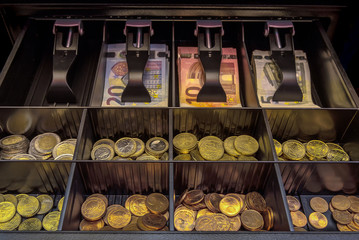 Money in a cash drawer with Euro banknotes. Concept: money or shopping